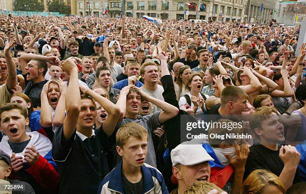 Russian fans react to their team's 3-2 defeat to Belgium at the 2002 World Cup games June 14, 2002 in Moscow, Russia.