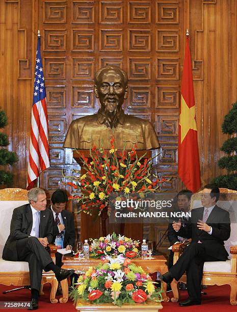 President George W. Bush and Vietnamese Prime Minister Nguyen Tan Dung meet 17 November 2006 in Hanoi. Bush is in Vietnam for the APEC Summit. AFP...