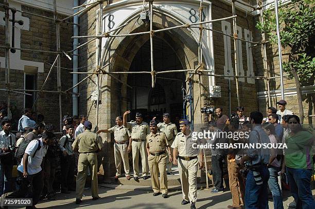 News photographers and TV camermen crowd at the entrance of the Azad Maidan Police Station where the bodyguards of US actress Angelina Jolie were...