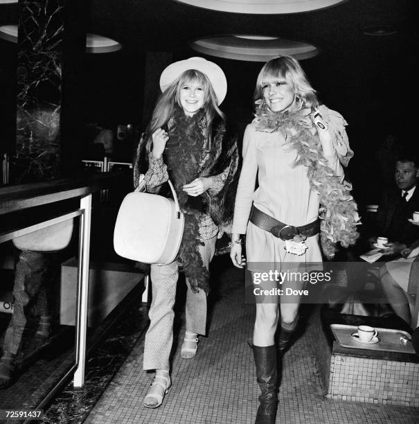 Singer Marianne Faithfull and actress Anita Pallenberg at Heathrow Airport to fly to Tangiers with their Rolling Stones boyfriends, 11th March 1967.