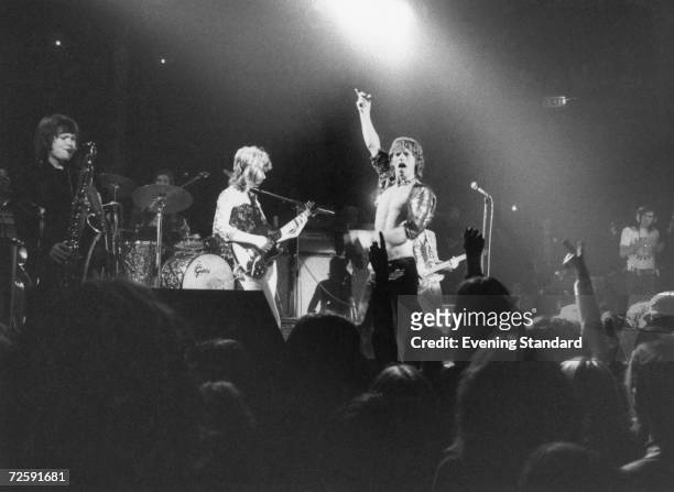 The Rolling Stones perform at the Roundhouse, London, 14th March 1971. The band features Bobby Keys on saxophone, left, and Mick Taylor on guitar,...