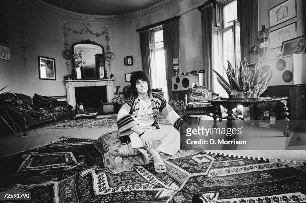 Rolling Stones guitarist Ron Wood at 'The Wick', his home in Richmond, Middlesex, 25th July 1974.