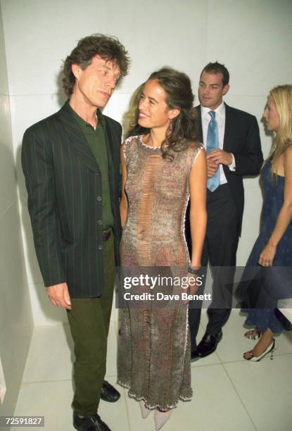 Rolling Stones singer Mick Jagger with his daughter Jade at the launch of her jewellery range, London, 20th September 1999.