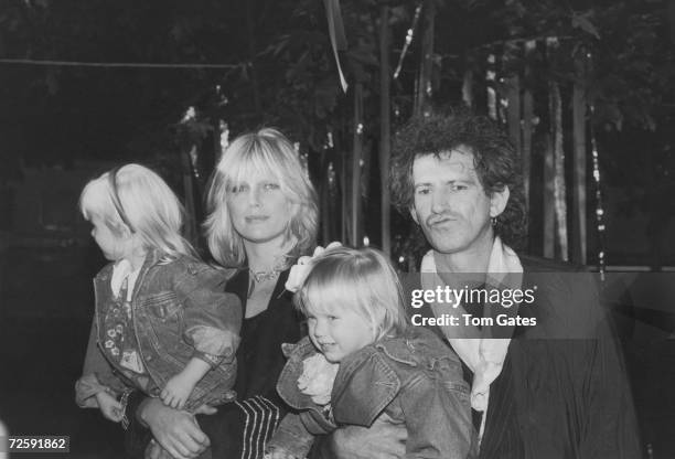 Guitarist Keith Richards of the Rolling Stones arives at the Big Apple Circus at the Lincoln Center's Damrosch Park with his wife Patti and their...