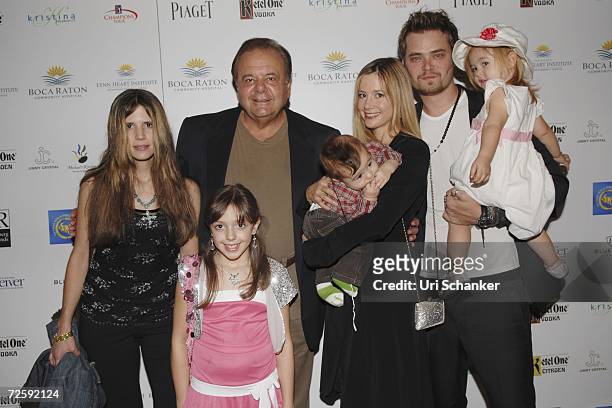 Amanda Sorvino, Paul Sorvino, granddaughter Claudia Sorvino , Mira Sorvino holding son Johnny and her husband Christopher Backus holding daughter...
