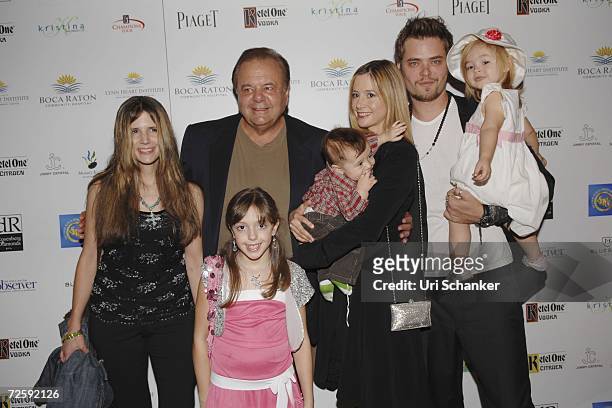 Amanda Sorvino, Paul Sorvino, granddaughter Claudia Sorvino , Mira Sorvino holding son Johnny and her husband Christopher Backus holding daughter...