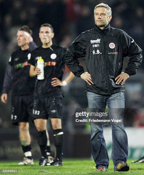 Coach Andreas Bergmann of St. Pauli looks dejected after the Third League match between FC St.Pauli and Rot Weiss Erfurt at the Millerntor stadium on...