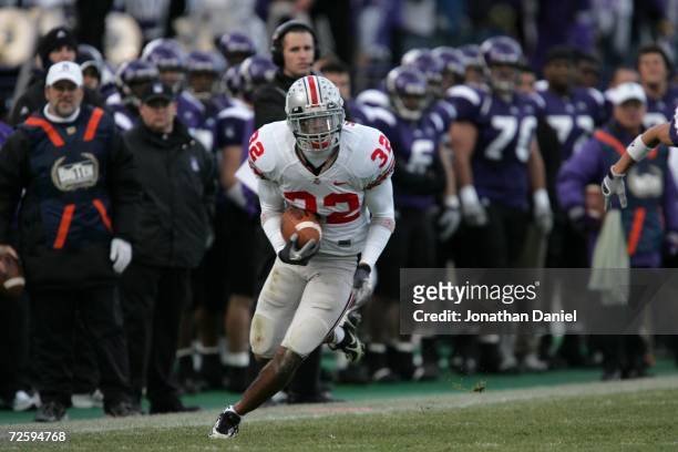 Free safety Brandon Mitchell of the Ohio State University Buckeyes carries the ball against the Northwestern University Wildcats on November 11, 2006...