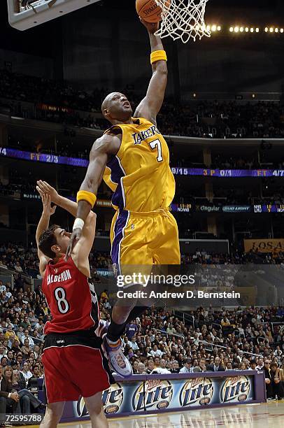 Lamar Odom of the Los Angeles Lakers goes to the basket against Jose Calderon of the Toronto Raptors November 17, 2006 at Staples Center in Los...