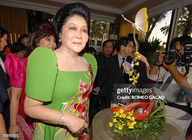 Former first lady Imelda Marcos, widow of the late deposed Philippine dictator Ferdinand Marcos, accompanied by daughter Congresswoman Imee Marcos...