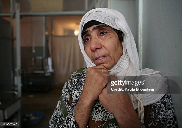 Homaira cries for her daughter, Hajar a self-immolation victim in serious condition November 17, 2006 in Herat, Afghanistan. She is being treated at...