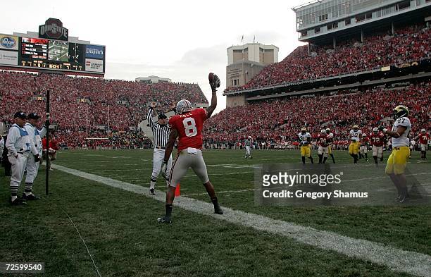 Roy Hall of the Ohio State Buckeyes celebrates his first quarter touchdown against the Michigan Wolverines November 18, 2006 at Ohio Stadium in...
