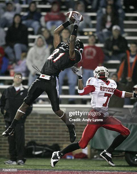 Mike Mickens of the Cincinnati Bearcats intercepts a pass in the end zone over Tiquan Underwood of the Rutgers Scarlet Knights during the game on...