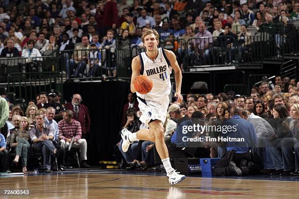 Dirk Nowitzki of the Dallas Mavericks pushes the ball up the court against the Memphis Grizzlies on November 18, 2006 at the American Airlines Center...