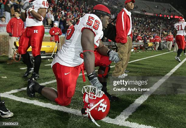 Eric Foster of the Rutgers Scarlet Knights is pictured alone in the bench area in the final minute of the game against the Cincinnati Bearcats on...