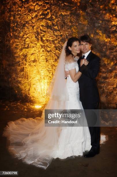 In this handout photo provided by Robert Evans, Tom Cruise and Katie Holmes pose together at Castello Odescalchi on their wedding day November 18,...