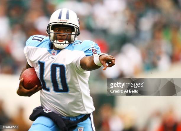 Vince Young of the Tennessee Titans runs with the ball against the Philadelphia Eagles on November 19, 2006 at Lincoln Financial Field in...