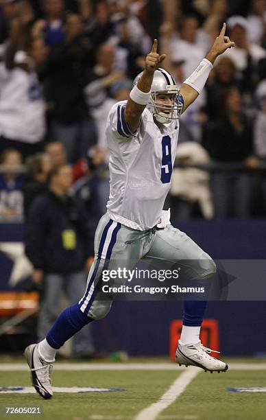 Tony Romo of the Dallas Cowboys celebrates after the Cowboys scored a fourth quarter touchdown against the Indianapolis Colts at Texas Stadium on...