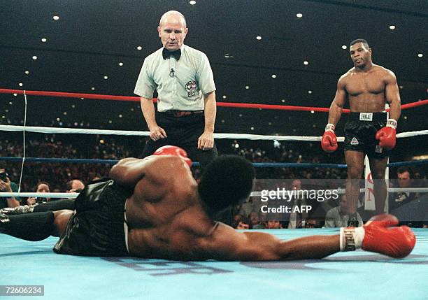 Las Vegas, UNITED STATES: A file picture taken 22 November 1986 in Las Vegas shows Mike Tyson during his fight against heavyweight champion Trevor...