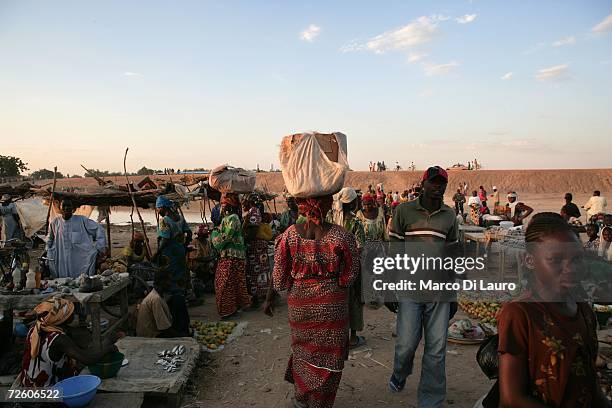 Chadian woman shop at the market on November 4, 2006 in N'Djamena, Chad. Chad declared a state of emergency in large areas of northern and southern...