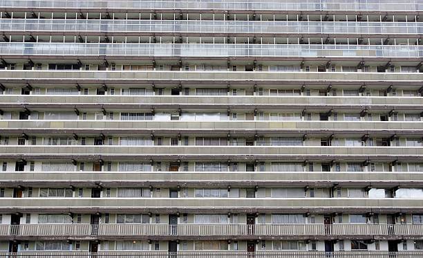The sun shines on a council estate on November 20, 2006 in London, England. According to a report by The Rowntree Foundation, council estates in...