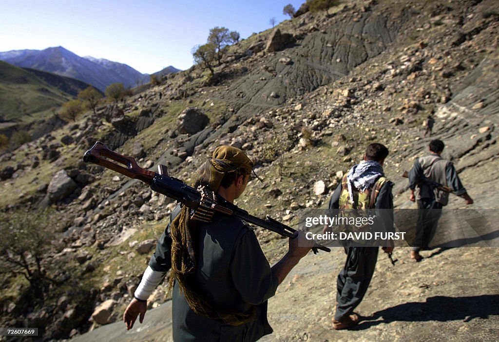 PKK guerillas patrol through a mountain