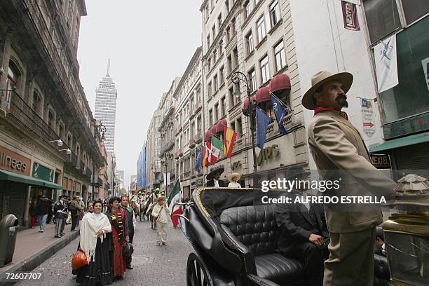 Man clad as the Mexican president during the Mexican Revolution, Francisco I. Madero , awaits for the beginning of the parade commemorating the 96th...