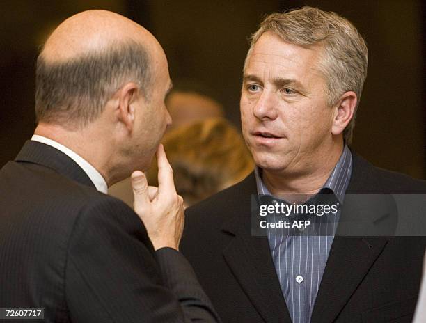 Former Tour de France winner, Greg Lemond talks with an old aquaintance, Alain Garnier during a break at the World Anti-Doping Agency board meeting...