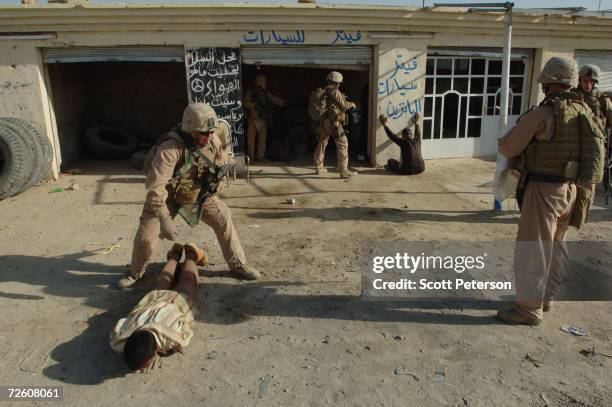 Marines of the 1st Battalion, 24th Marine Regiment headquartered in Detroit, Michigan conduct Operation Talon, a one-day search operation with the...