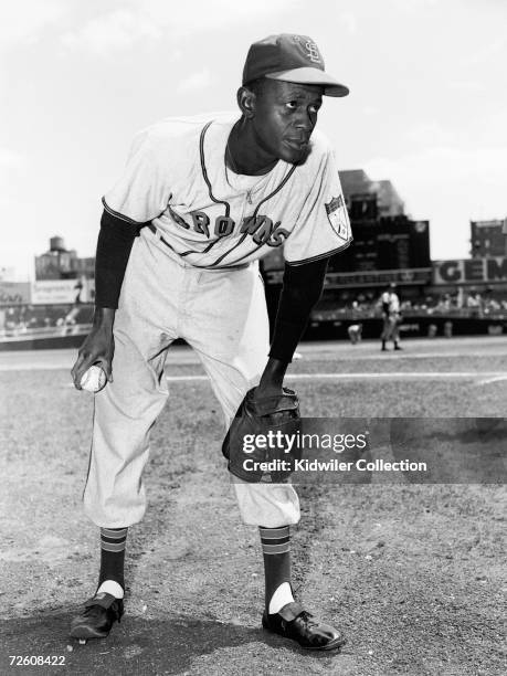 Pitcher Satchel Paige, of the St. Louis Browns, poses for a portrait prior to a game against the New York Yankees in 1951 at Yankee Stadium in New...