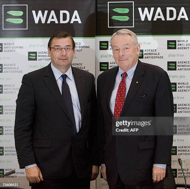 French Sports Minister Jean-Francois Lamour and World Anti-Doping Agency president Dick Pound pose following the WADA board meeting in Montreal 20...