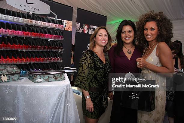 Actress Vanessa Williams poses with Creative Nail Design representatives Julia Labaton and Barbara Fogleman backstage at the American Music Awards...