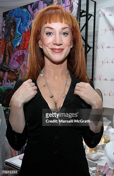 Comedian Kathy Griffin poses with the Jill Reno display backstage at the American Music Awards with distinctive assets held at the Shrine Auditorium...