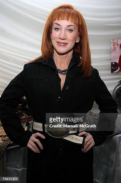 Comedian Kathy Griffin poses with the Latino Royalty display backstage at the American Music Awards with distinctive assets held at the Shrine...