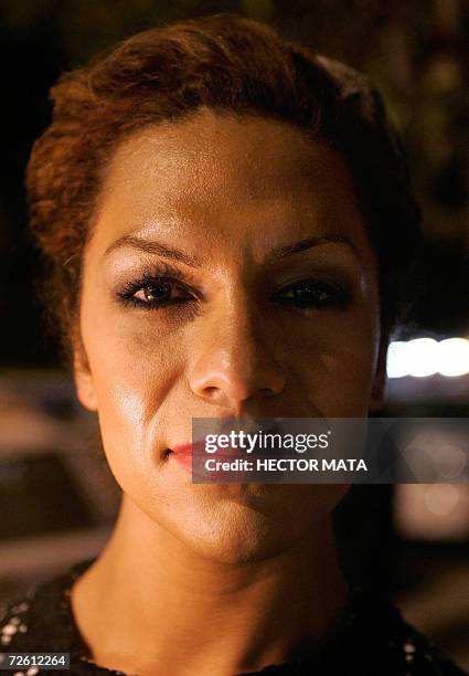 West Hollywood, UNITED STATES: A demonstrator poses for a portrait during the "Transgender Day of Remembrance" march in West Hollywood, CA, 20...