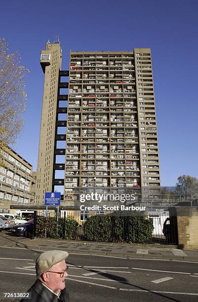 Man walks past Trellick Tower on November 21, 2006 in London, England. The building contains 217 flats and was originally entirely owned by the...