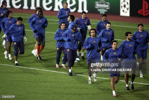 Barcelona's team warm up during the team's training session in Sofia, 21 November 2006, on the eve of their UEFA Champions League match against...