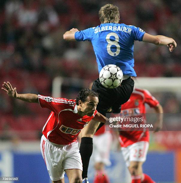 Benfica's player Brazilian Leonardo Bastos "Leo" vies with FC Copenhagen's Michael Silberbauer during their UEFA Champions League group F football...