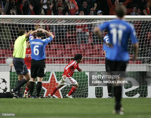 Benfica?s player Italian Fabrizio Miccoli runs celebrating his 2nd goal against FC Copenhagen during their UEFA Champions League group F football...
