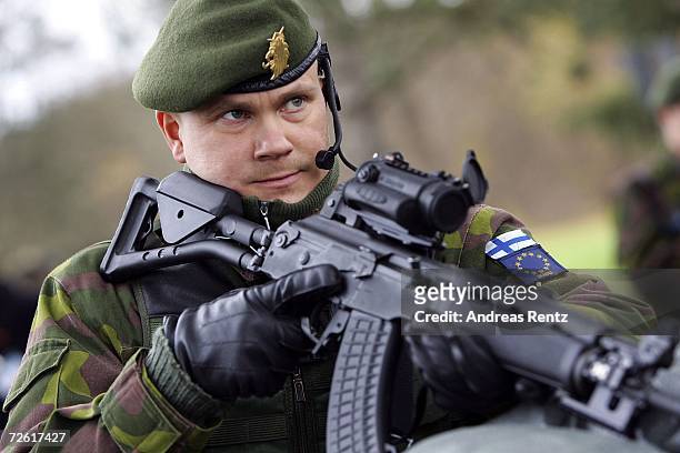 Finnish soldier patrols a military checkpoint on November 21, 2006 in Leipheim near Ulm, Germany. Germany, the Netherlands and Finland are working...