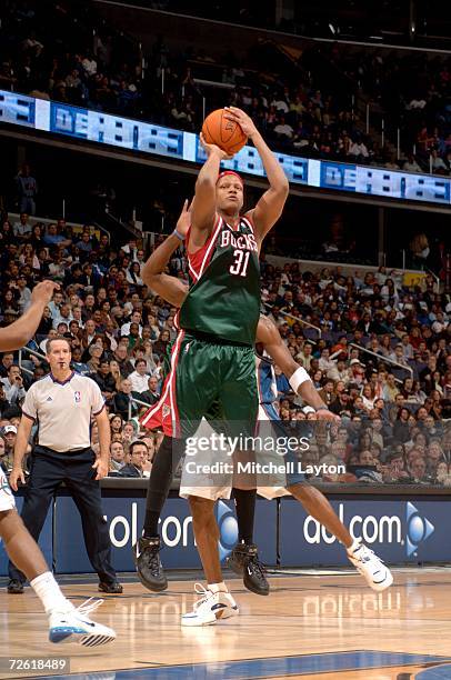 Charlie Villanueva of the Milwaukee Bucks shoots against the Washington Wizards on November 12, 2006 at the Verizon Center in Washington, DC. The...