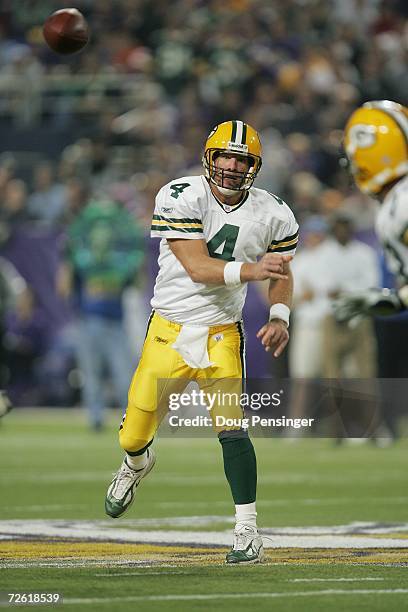 Quarterback Brett Favre of the Green Bay Packers throws a pass during the game against the Minnesota Vikings on November 12, 2006 at the Metrodome in...