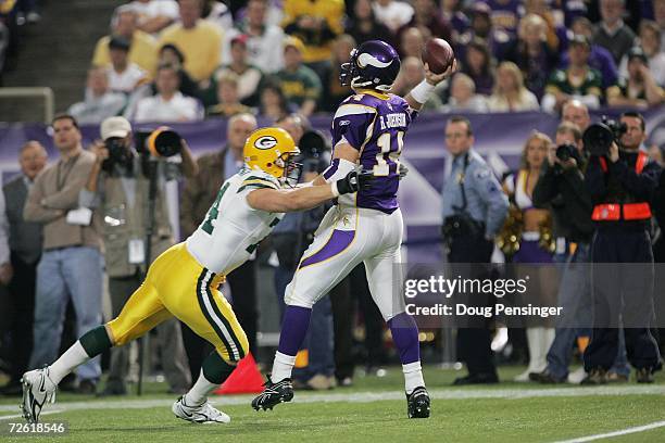 Defensive end Aaron Kampman of the Green Bay Packers pressures quarterback Brad Johnson of the Minnesota Vikings on November 12, 2006 at the...