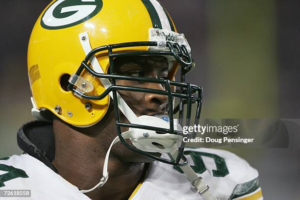 Defensive end Kabeer Gbaja-Biamila of the Green Bay Packers looks on during the game against the Minnesota Vikings on November 12, 2006 at the...