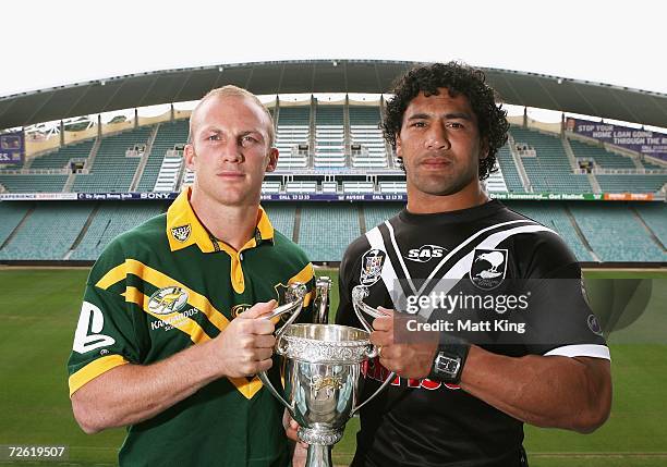 Darren Lockyer of the Kangaroos and Ruben Wiki of the Kiwis pose with the Tri-Nations trophy after the Tri Nations Final Captain's press conference...