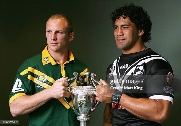 Darren Lockyer of the Kangaroos and Ruben Wiki of the Kiwis pose with the Tri-Nations trophy after the Tri Nations Final Captain's press conference...