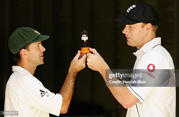 Ricky Ponting captain of Australia and Andrew Flintoff captain of England pose with a replica Ashes urn ahead of the First Ashes Test at the Gabba on...
