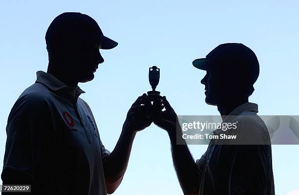 England captain Andrew Flintoff and Australian captain Ricky Ponting hold the replica Ashes urn during the Australia nets session at the Gabba on...