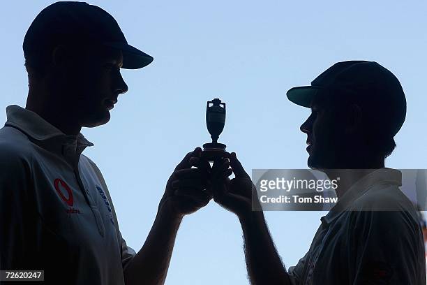 England captain Andrew Flintoff and Australian captain Ricky Ponting hold the replica Ashes urn during the Australia nets session at the Gabba on...