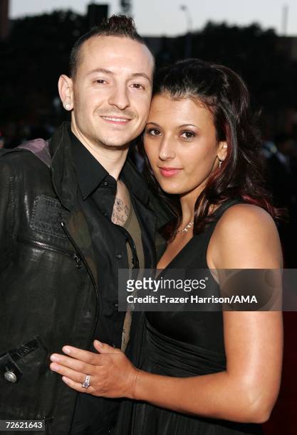 Musician Chester Bennington of the band Linkin Park and wife Talinda arrive at the 2006 American Music Awards held at the Shrine Auditorium on...